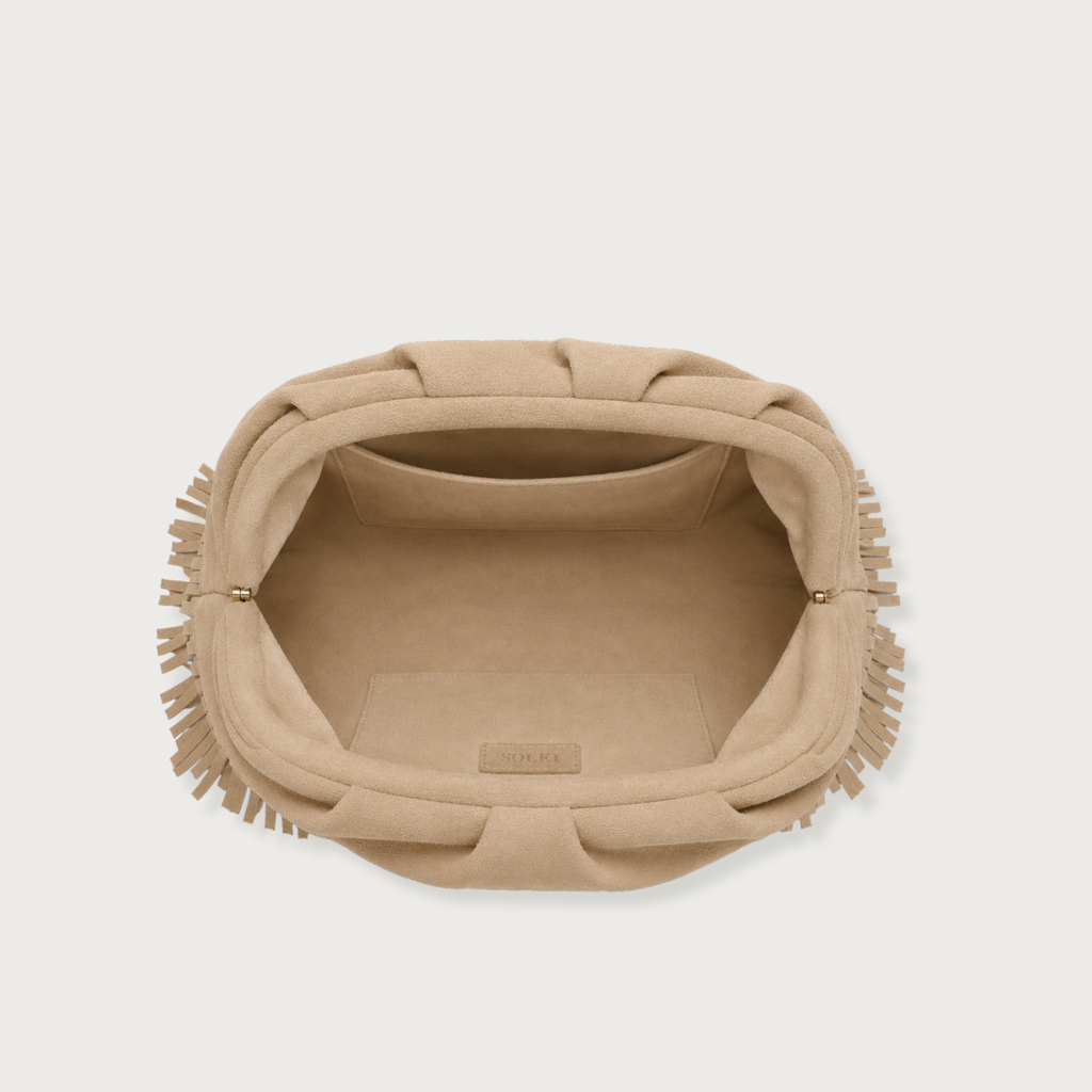 The Plume Clutch in Sand Suede